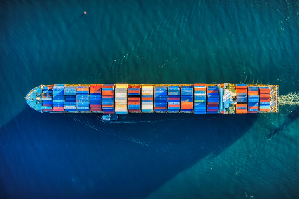 Aerial view of a loaded container ship under way